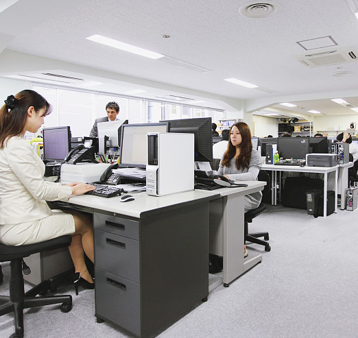 Bright and tidy modern office inside a printing packaging factory | HugPak