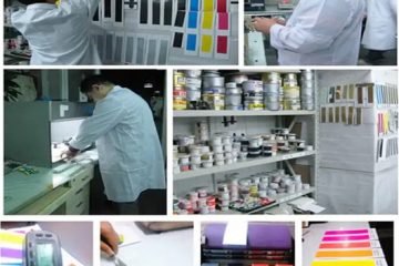 Inspector checking printed packaging samples for defects | Hug Packaging